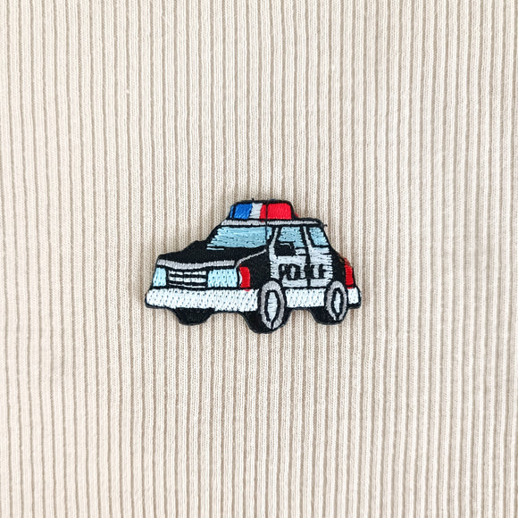 SILITETTÄVÄ MERKKI POLIISIAUTO